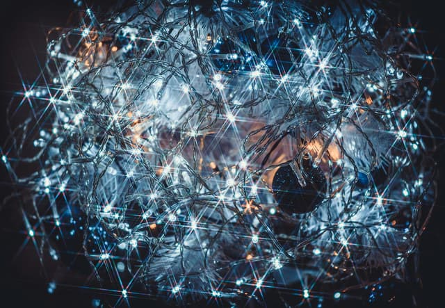 a computer generated image of a ball of lights